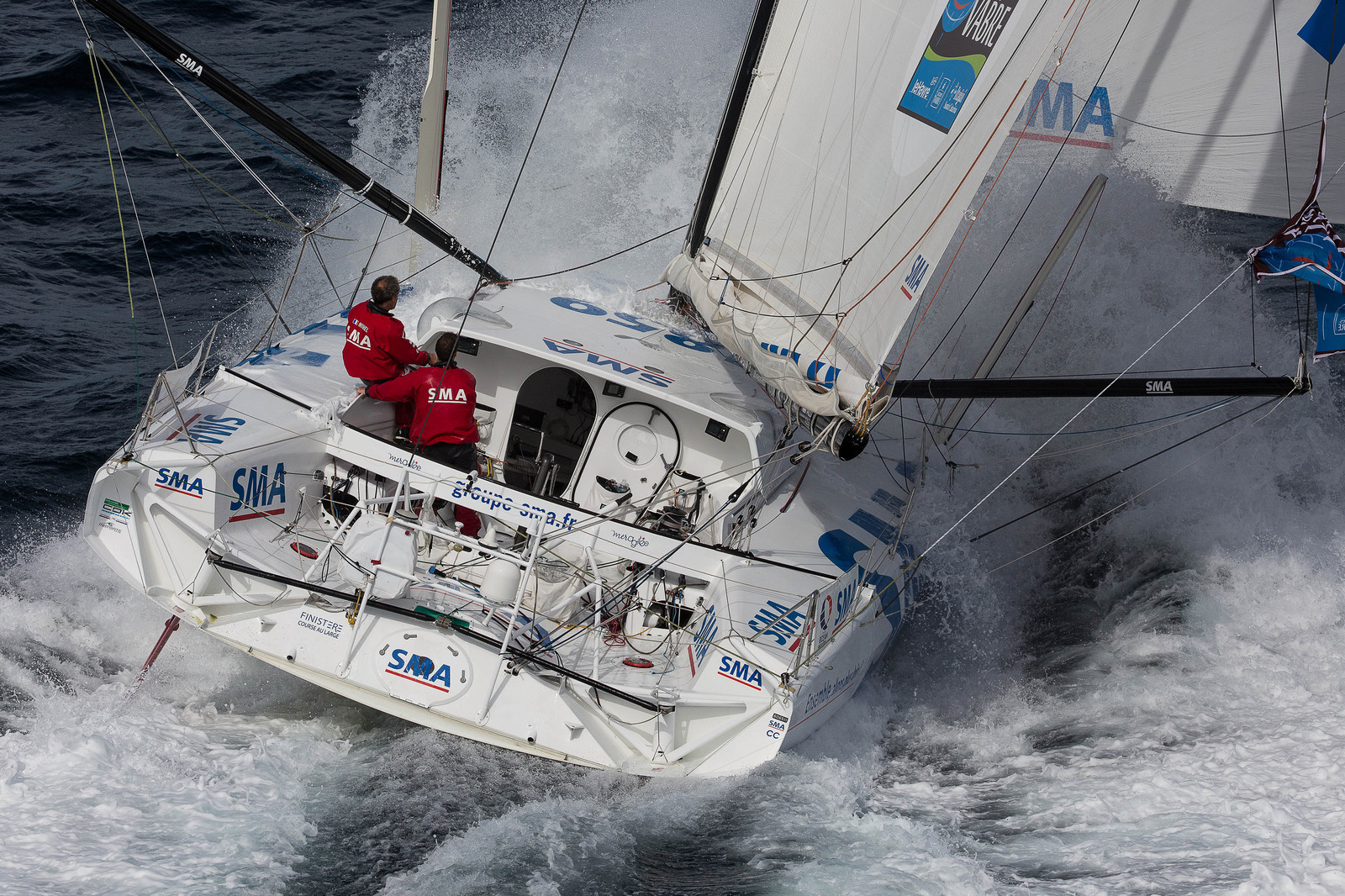 ..Paul Meilhat and Michel Desjoyeaux (Fra) training onboard IMOCA SMA before the start of Transat Jacques Vabre 2015 from Le Havre to Itajai off Groix, 16 09 2015, Photo © Jean-Marie LIOT   DPPI